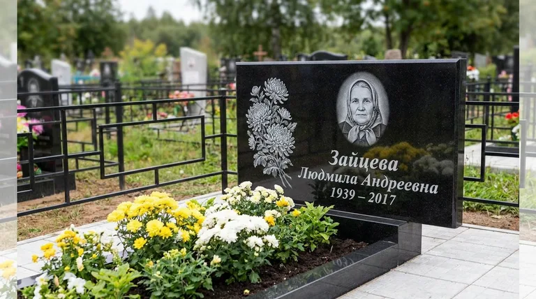 Памятник с гравировкой хризантем — выполненная работа «Зайцева» в Нижнем Новгороде