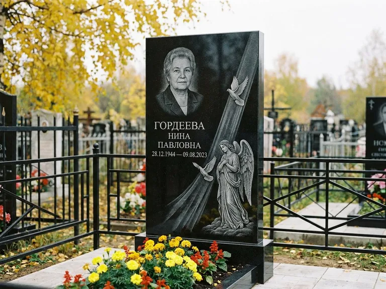 Памятник с гравировкой ангела — гравировка ангела с голубем по диагонали стелы, работа «Гордеева» в Нижнем Новгороде