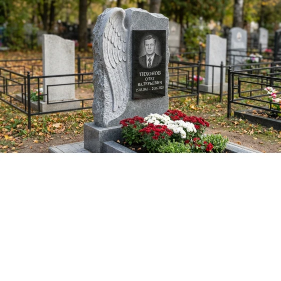 Мемориал с крылом ангела из серого гранита