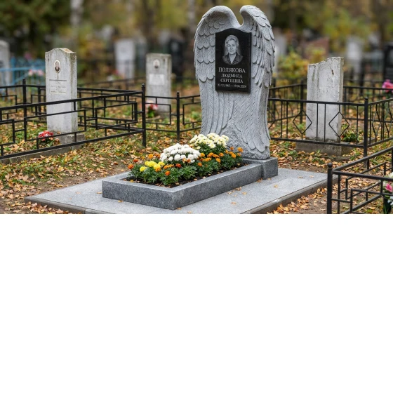 Памятник с крылом ангела из мансуровского гранита с портретом
