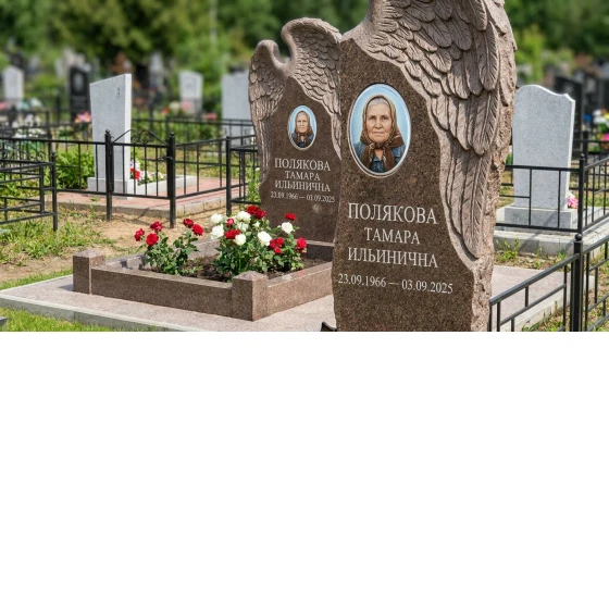 Памятник с ангельским крылом из дымовского гранита