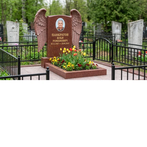 Памятник с парящими крыльями ангела из лезниковского гранита