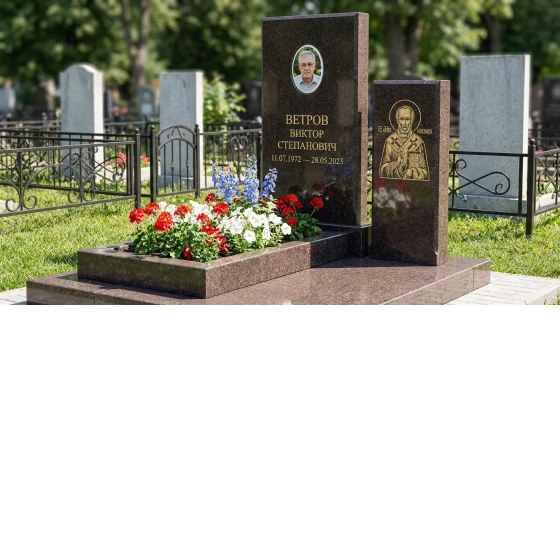 Памятник с иконой Николая Чудотворца из дымовского гранита с овальной фотокерамикой