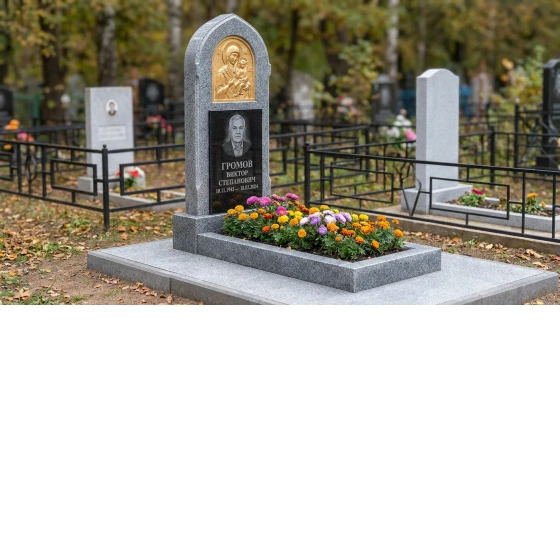 Памятник с иконой богородицы из мансуровского гранита с художественной резьбой